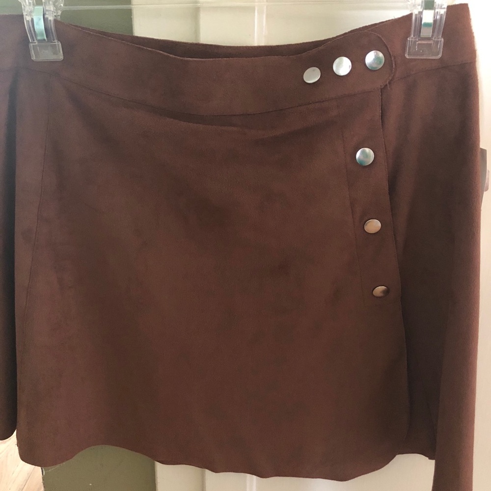 Brown suede material skirt with silver buttons